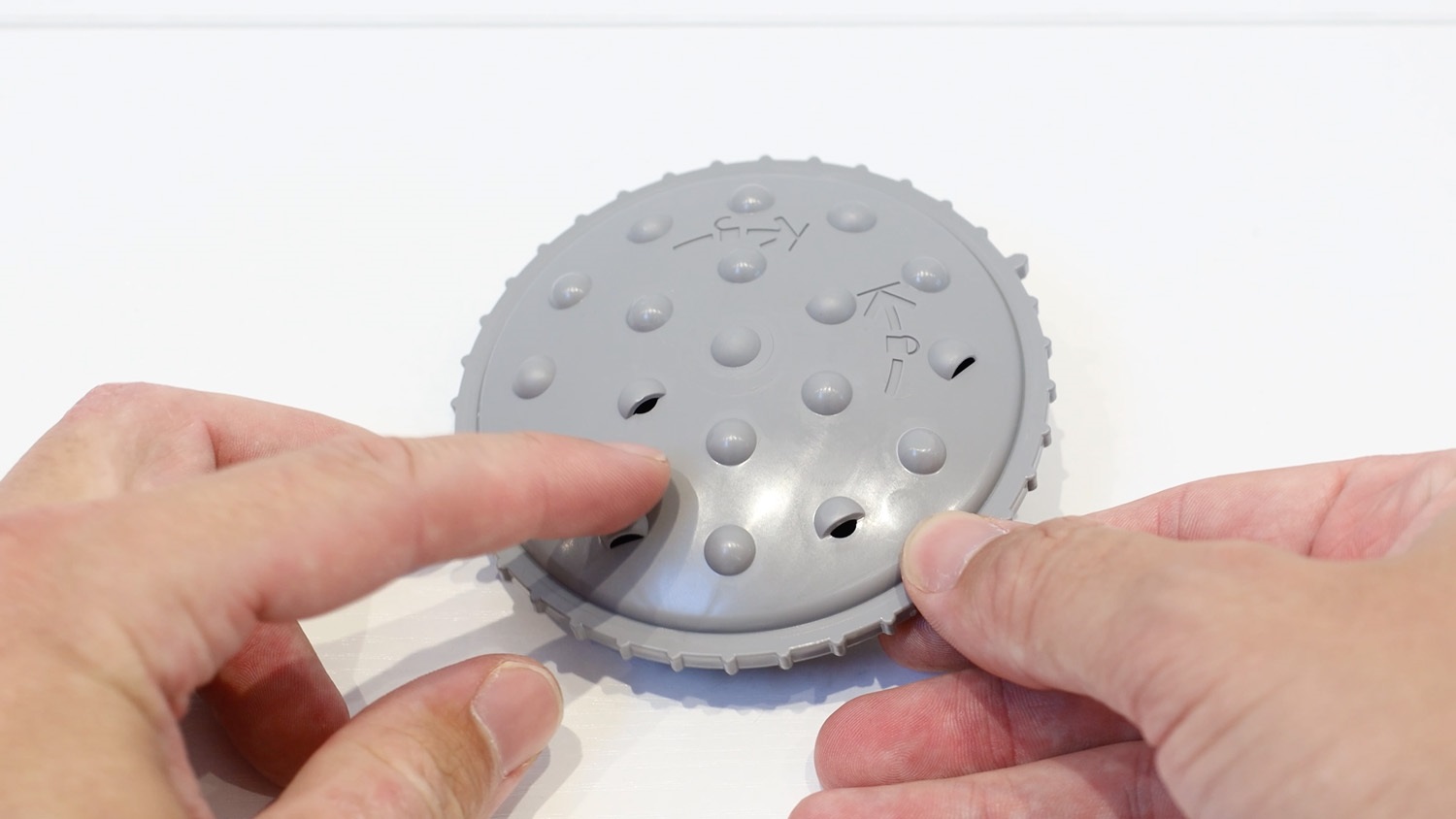 showing shower spray head holes