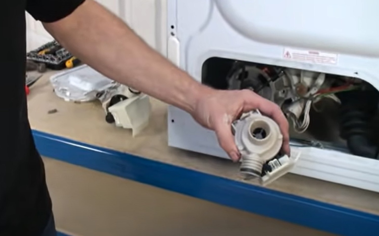 How to fit a pump to a hotpoint washing machine fit new pump