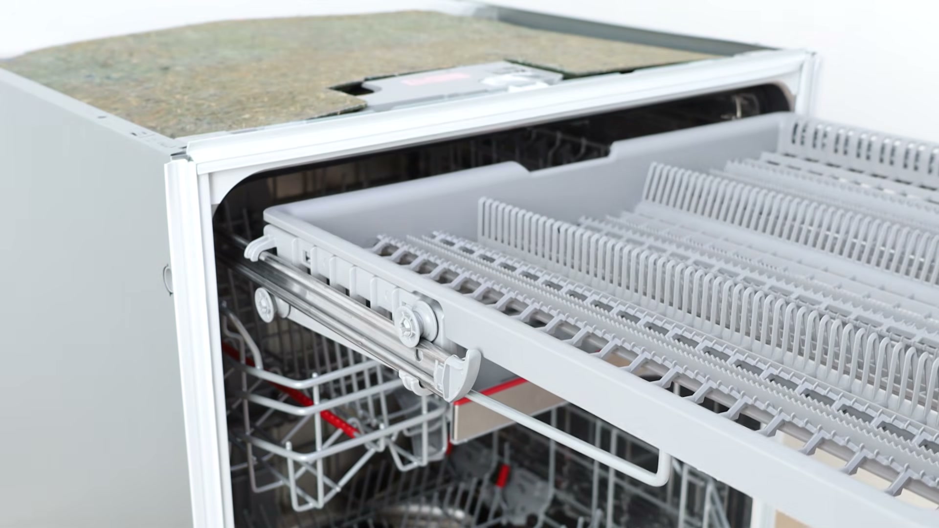 Refitting the new cutlery drawer onto its rails