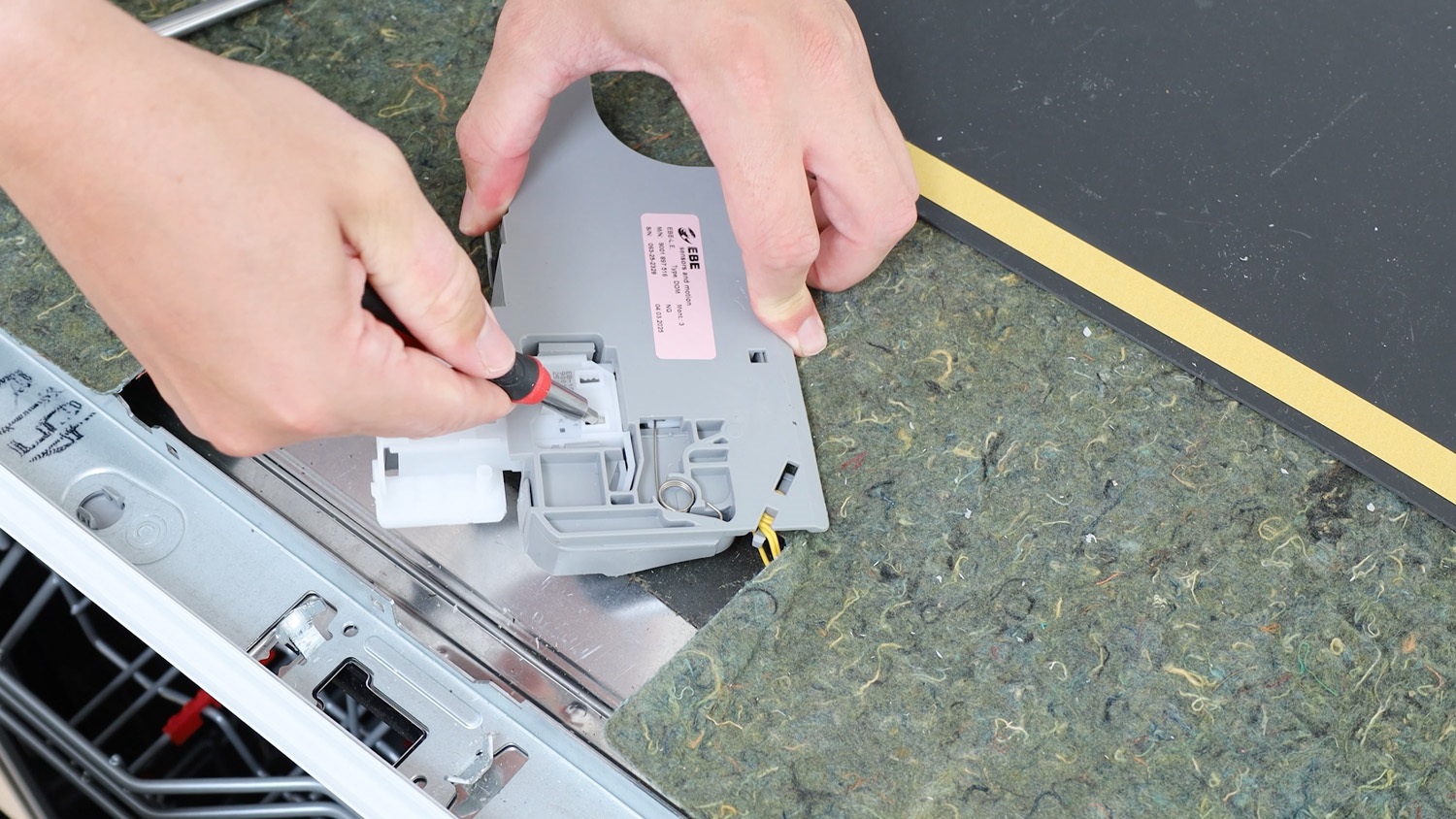 move plastic clip forward and towards door opening module