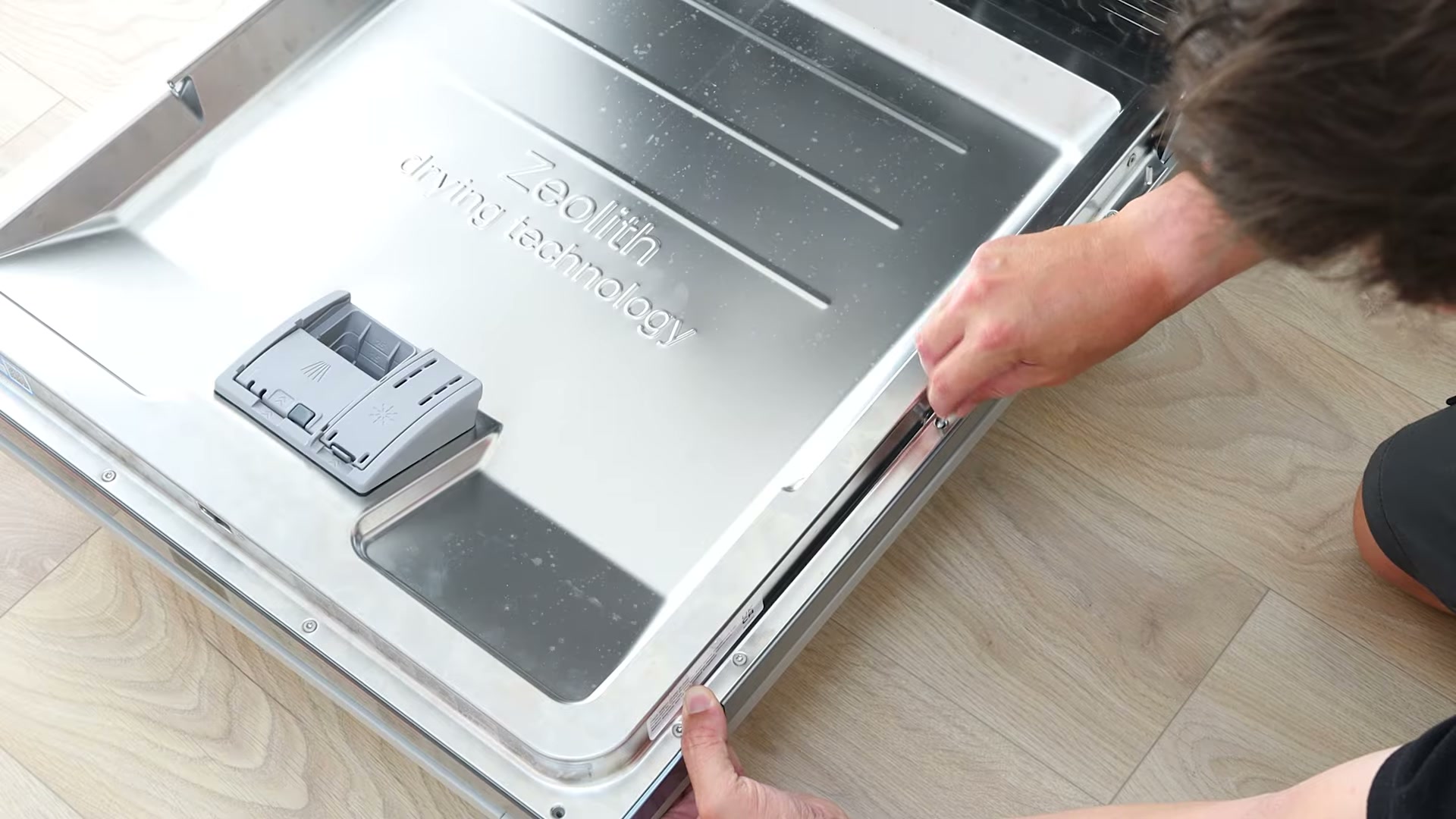 Reattaching the integrated cabinet door to a Bosch dishwasher