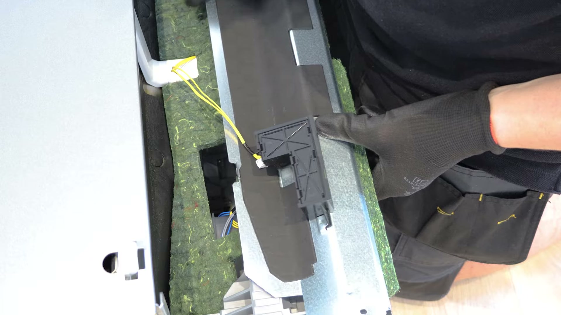 Unclipping the electrical connector from the display module
