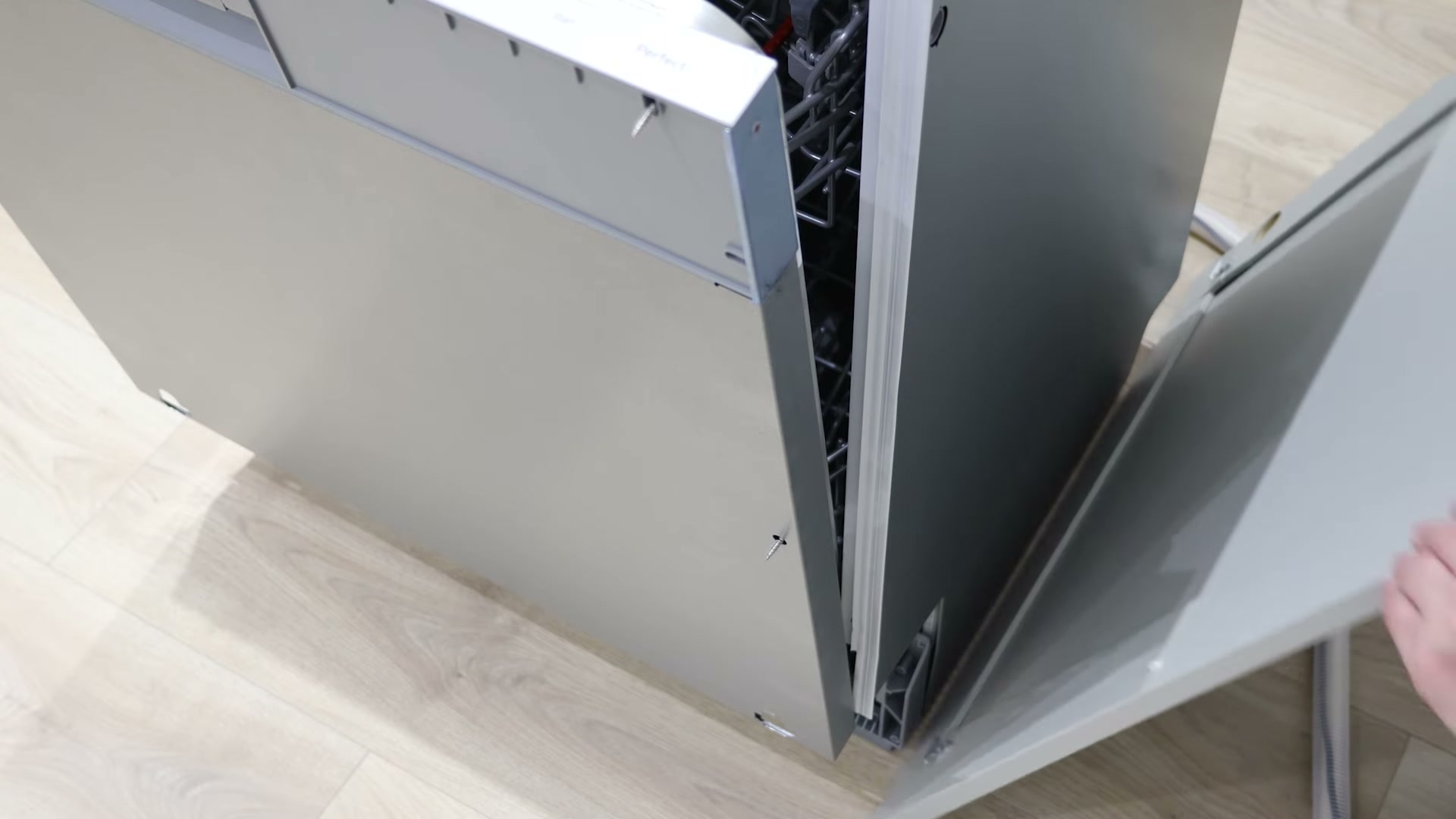 Reattaching the integrated cabinet door to a Bosch dishwasher