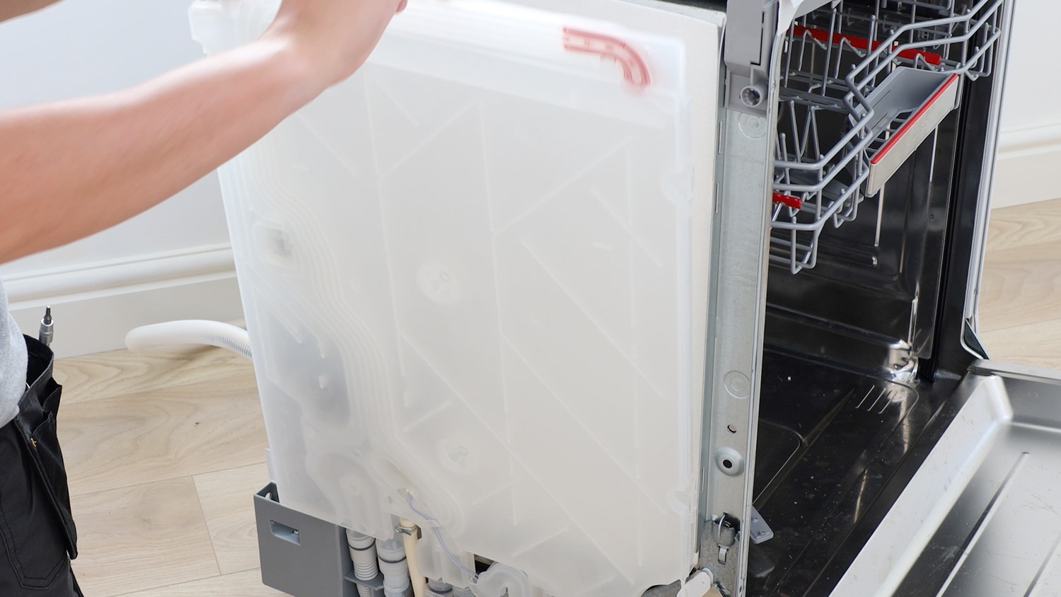 pull water inlet chamber slightly away from dishwasher