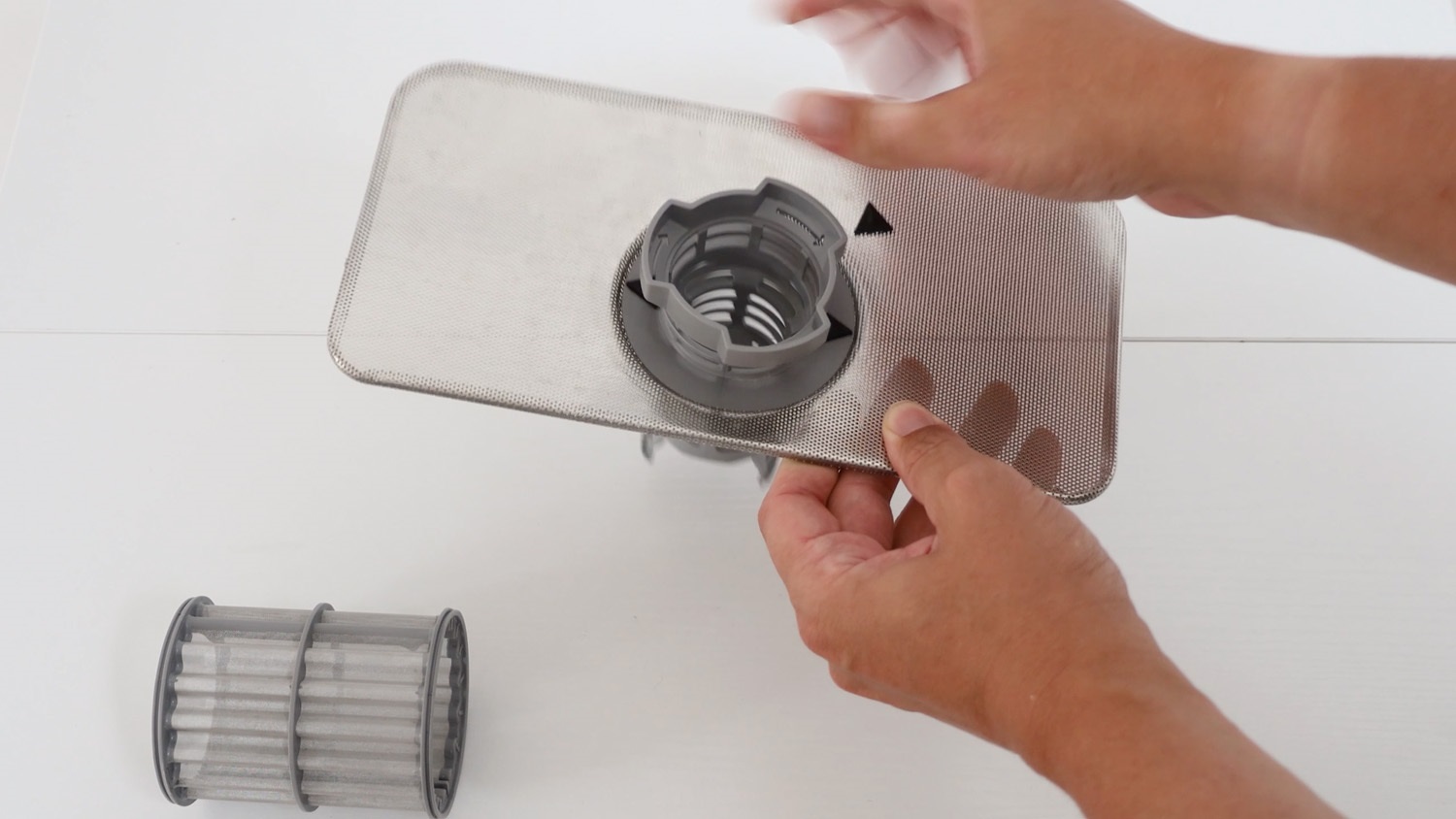 attach the plastic part of the filter to the filter plate