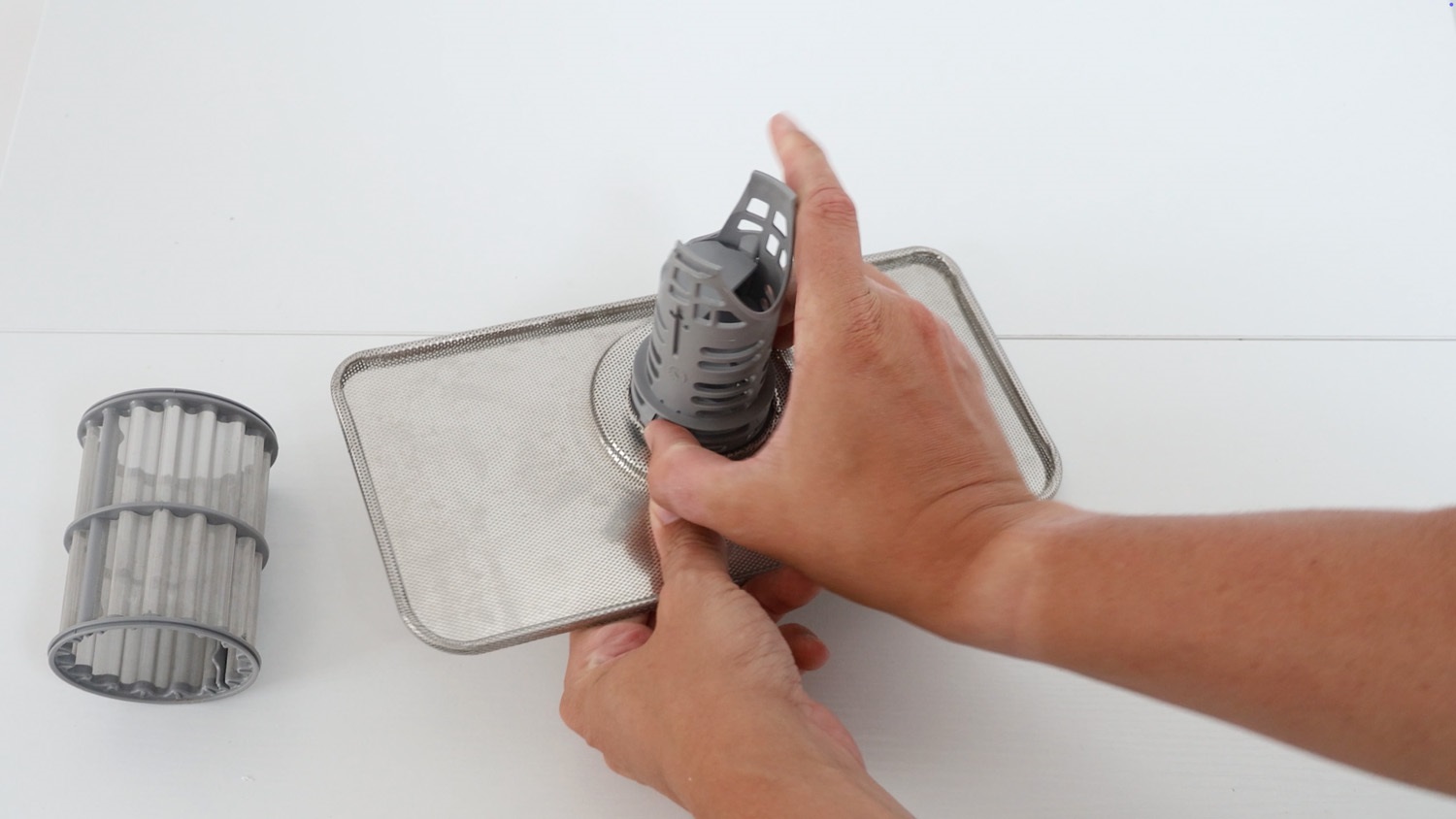 pinch tabs on side to release