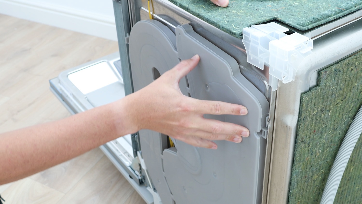 re-clip heat exchanger to dishwasher housing