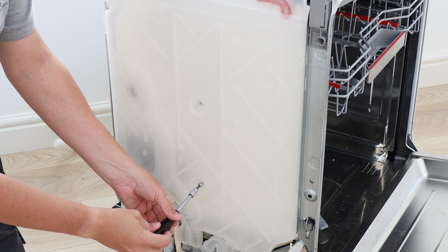 Remove screw holding water inlet side chamber in place
