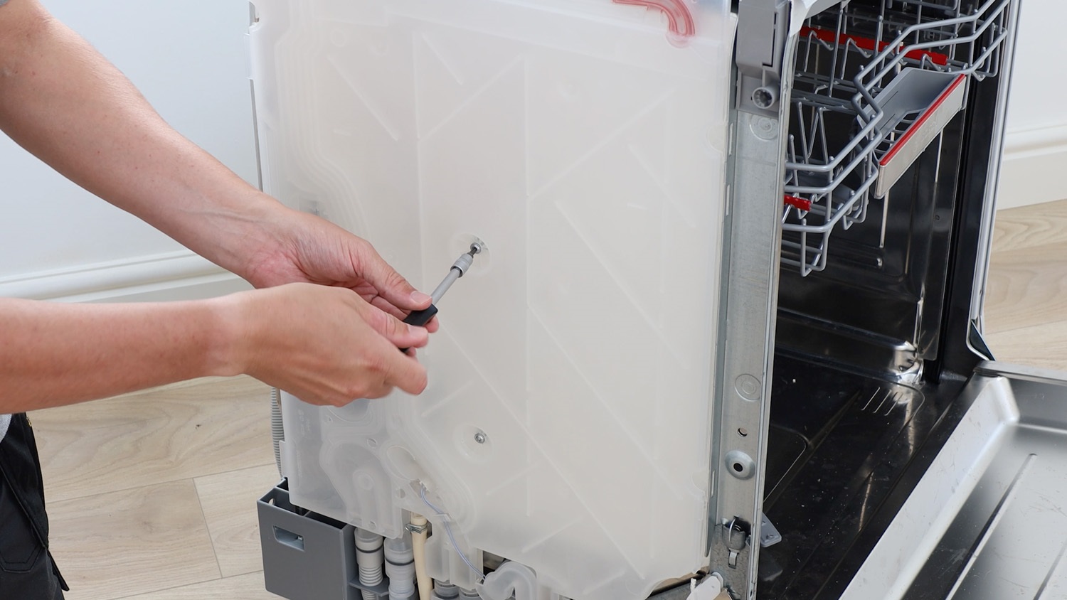 Remove screws holding water inlet side chamber in place