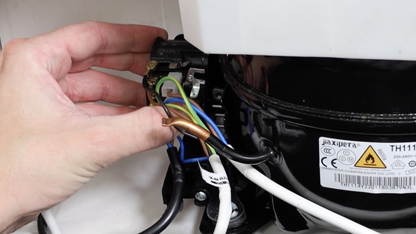 Access and remove old capacitor