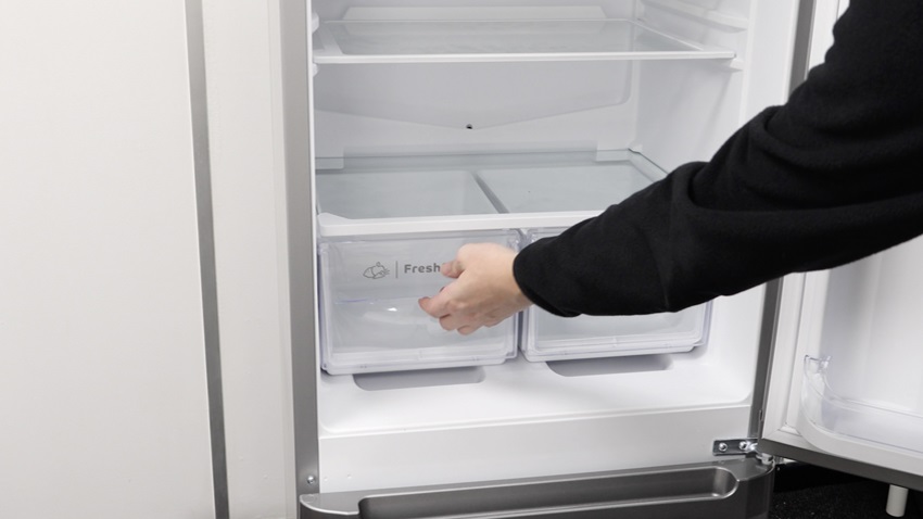 Remove the old salad drawer front handle