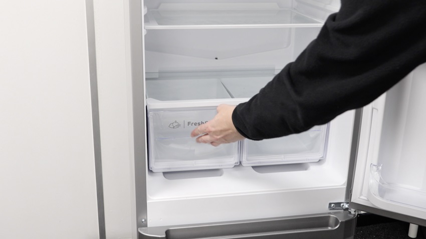 Attach new salad drawer front handle