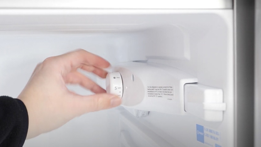 Remove temperature dial from fridge freezer