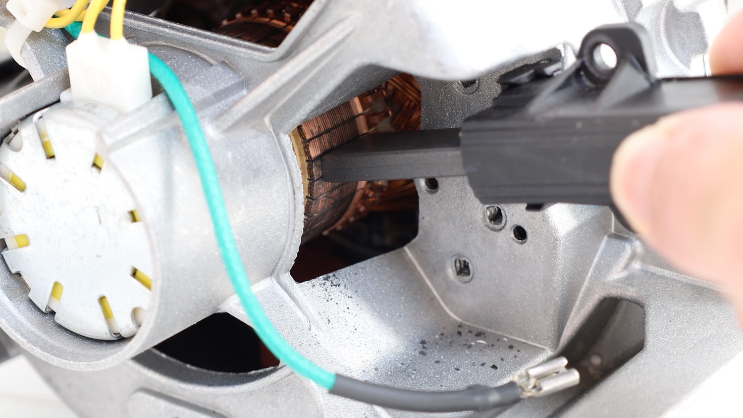 Attach new carbon brushes