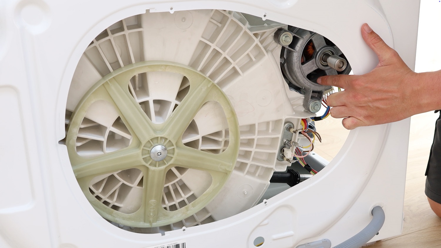 Locate the motor unit where the carbon brushes are
