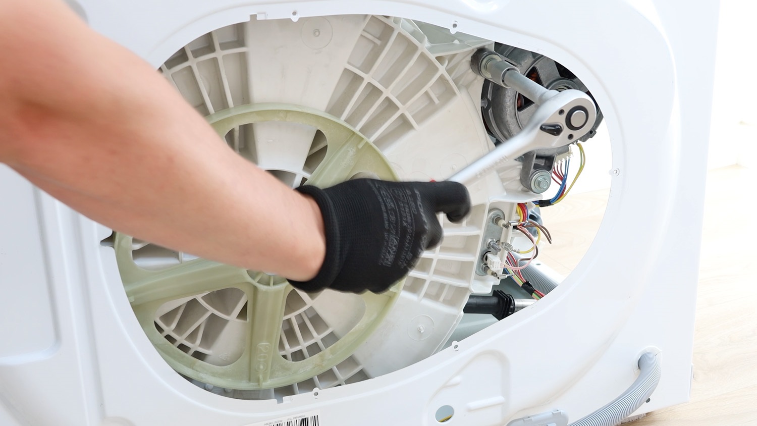Remove 10mm bolts holding motor unit in place