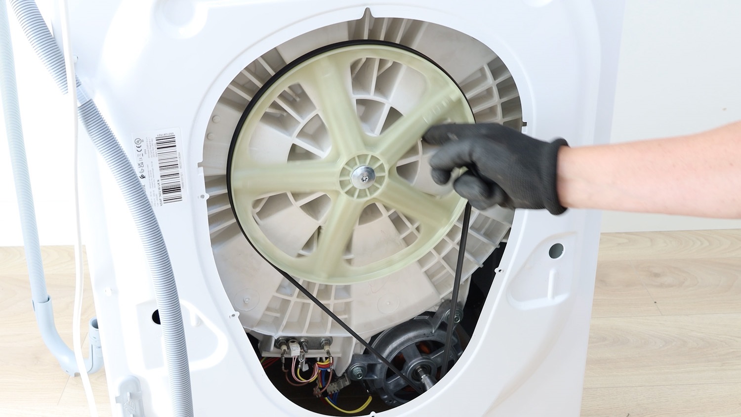 Spin pulley wheel to make sure belt is on correctly
