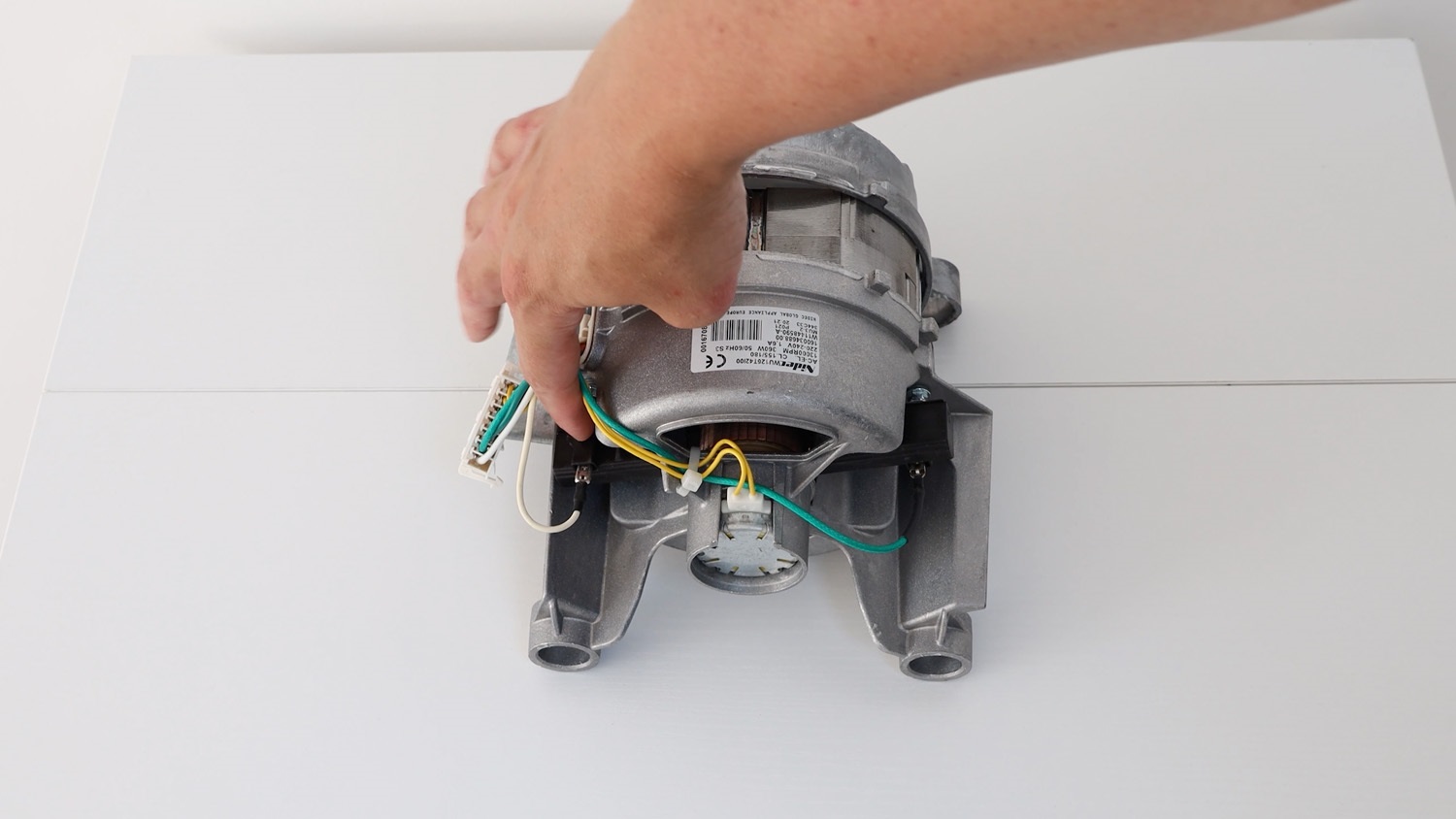 Where to find the carbon brushes on the motor unit