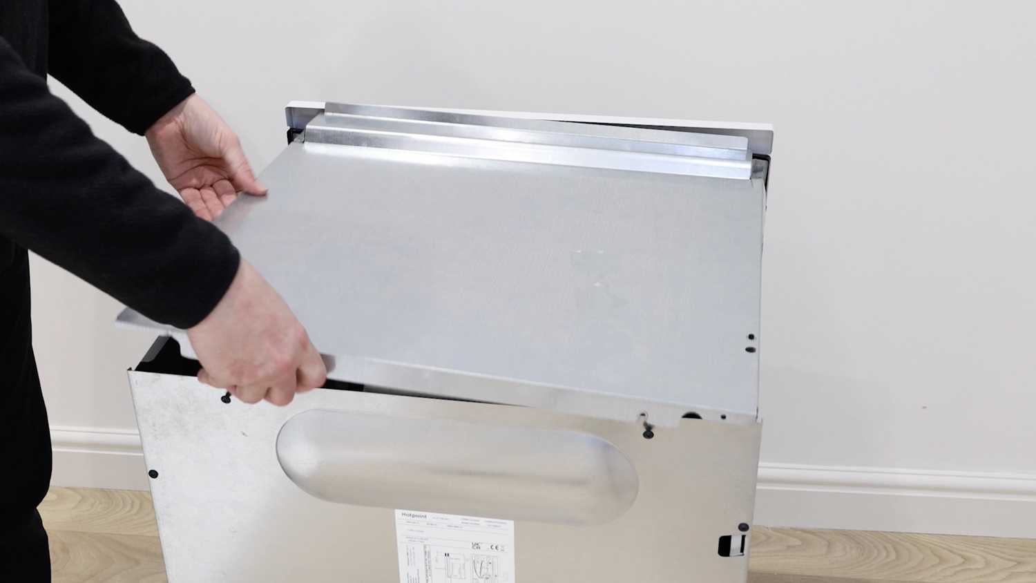 Re-attach the top oven panel