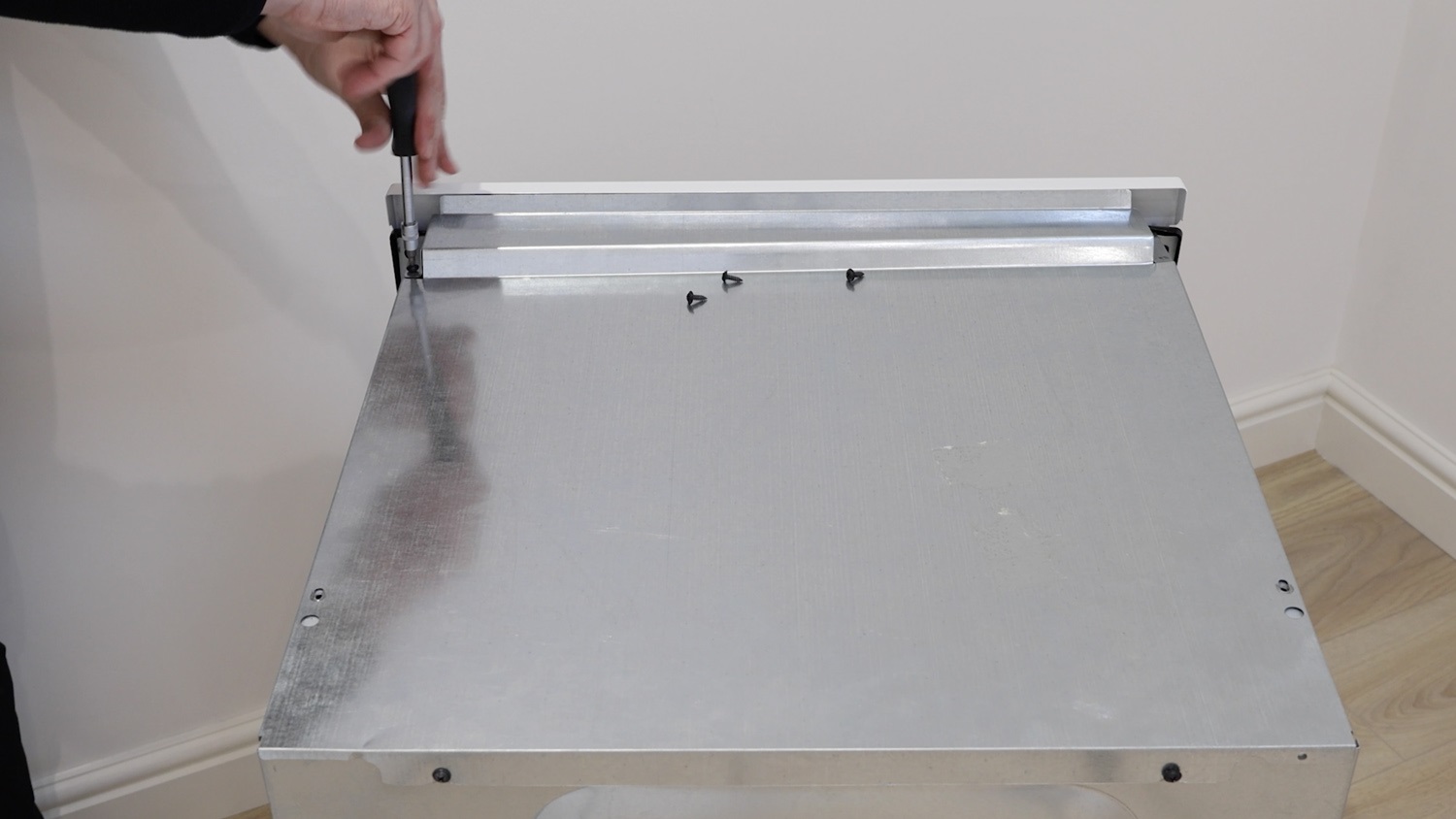 Remove top panel screws