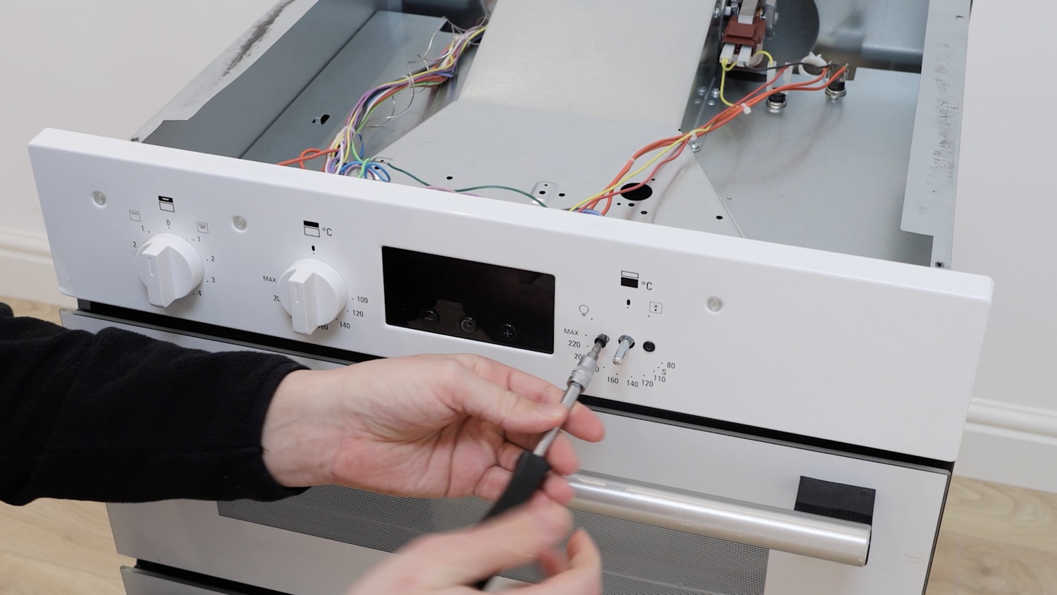 Remove two screw holding temperature switch in place
