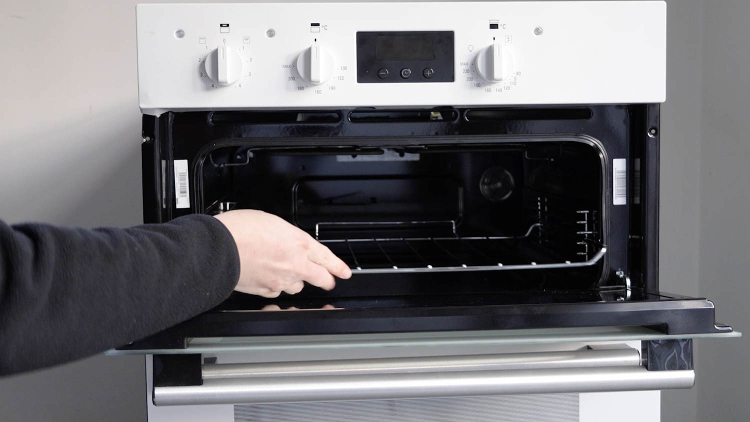 Place any shelves and trays back in the oven