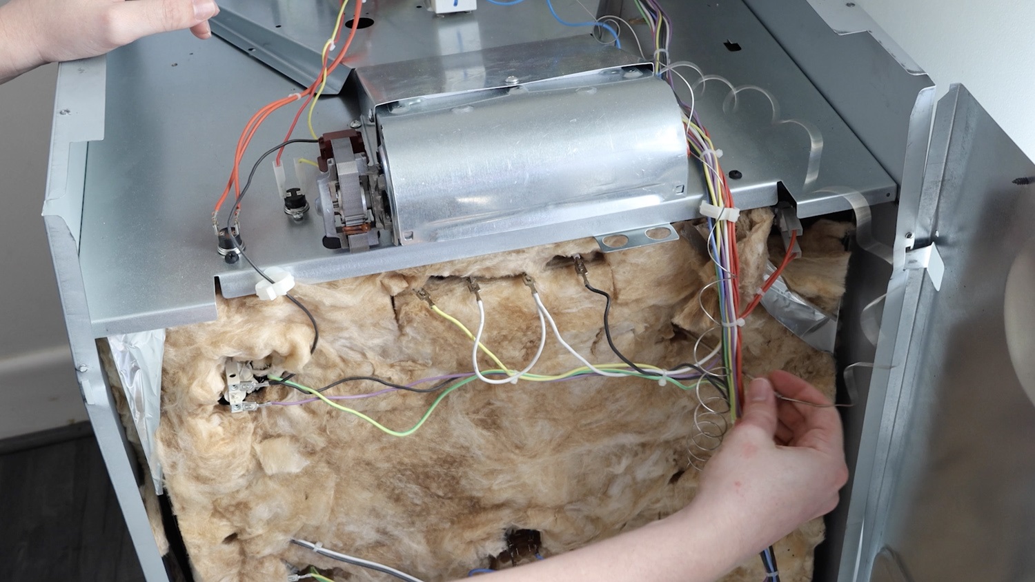 Remove thermostat capillary tube from back of oven