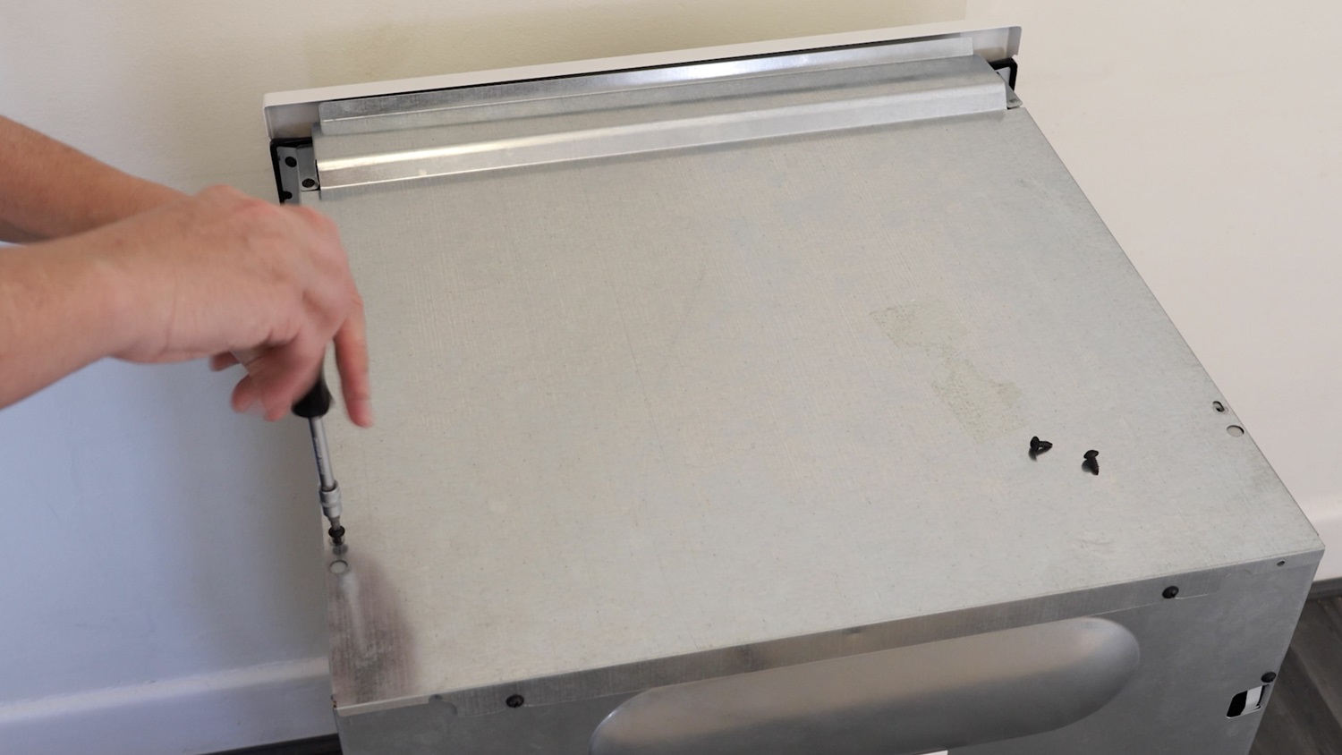 Remove top screws