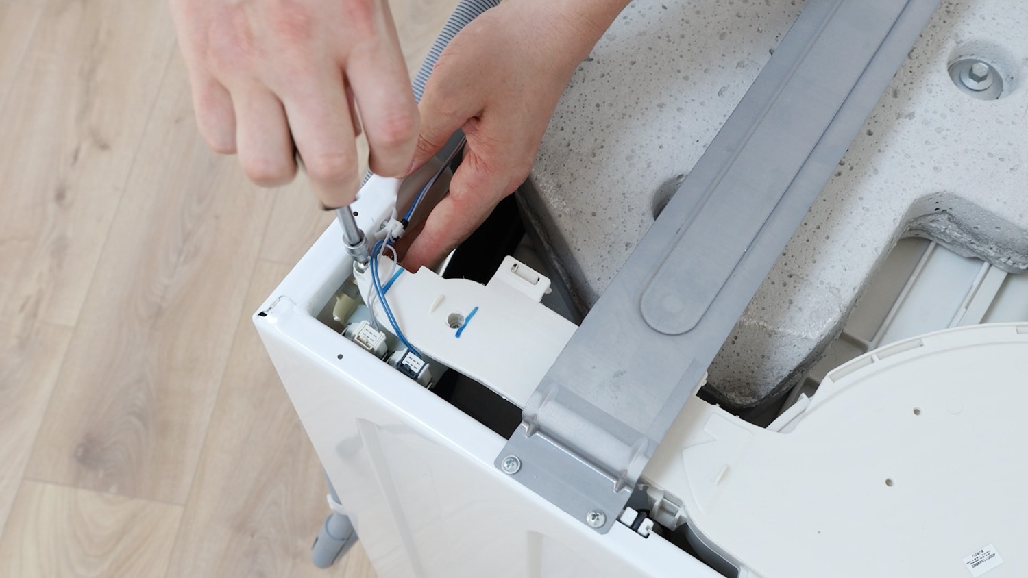 Remove screws holding hopper assembly