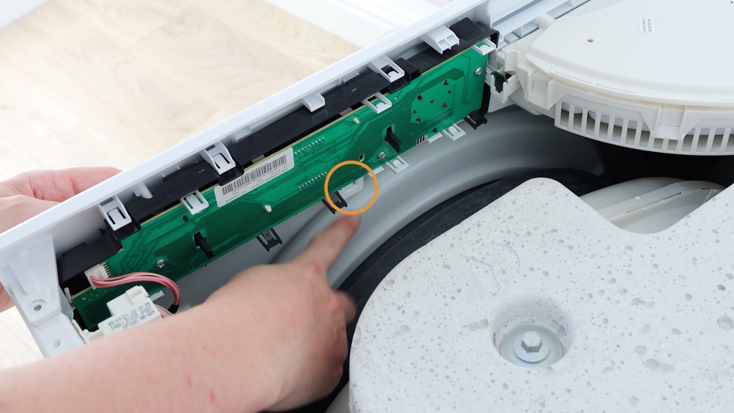 Unclip clips holding control panel in place