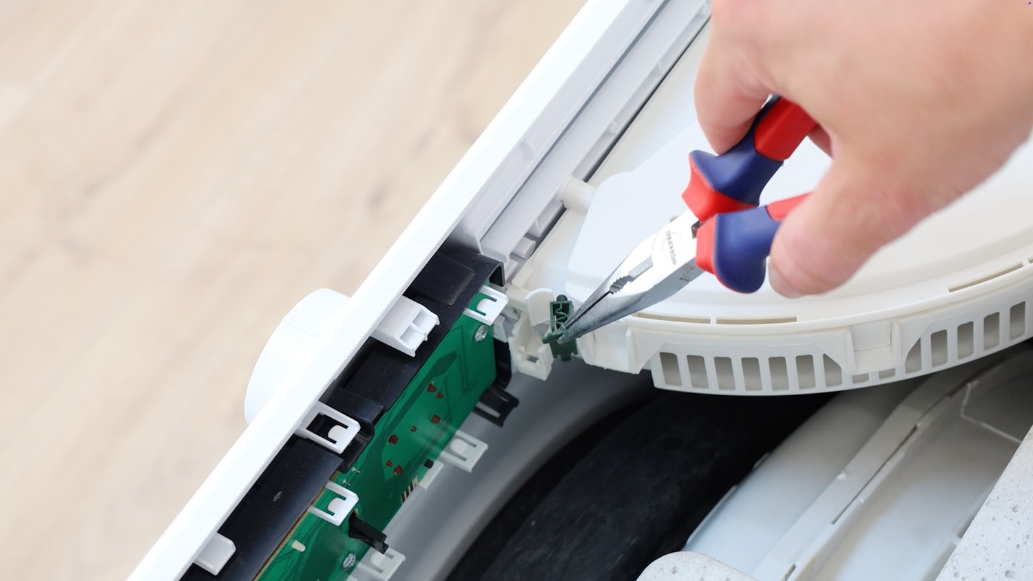 Remove with long nose pliers