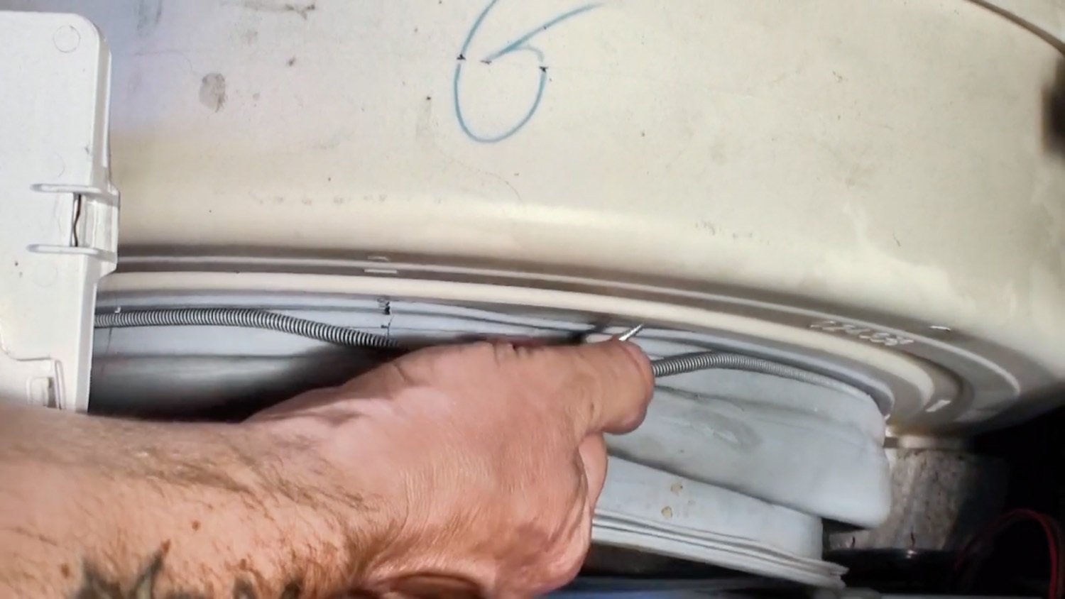 Remove retaining spring
