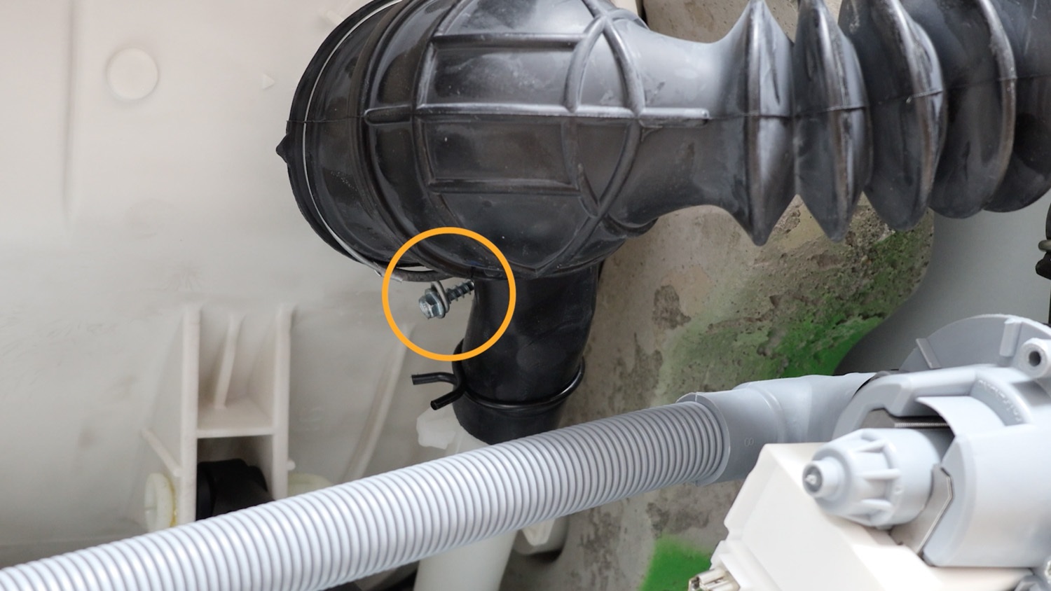 Loosen screw shown here in orange