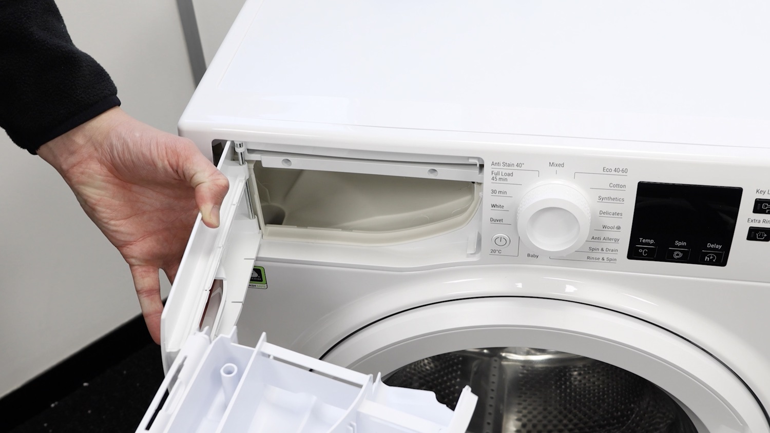 Remove detergent drawer