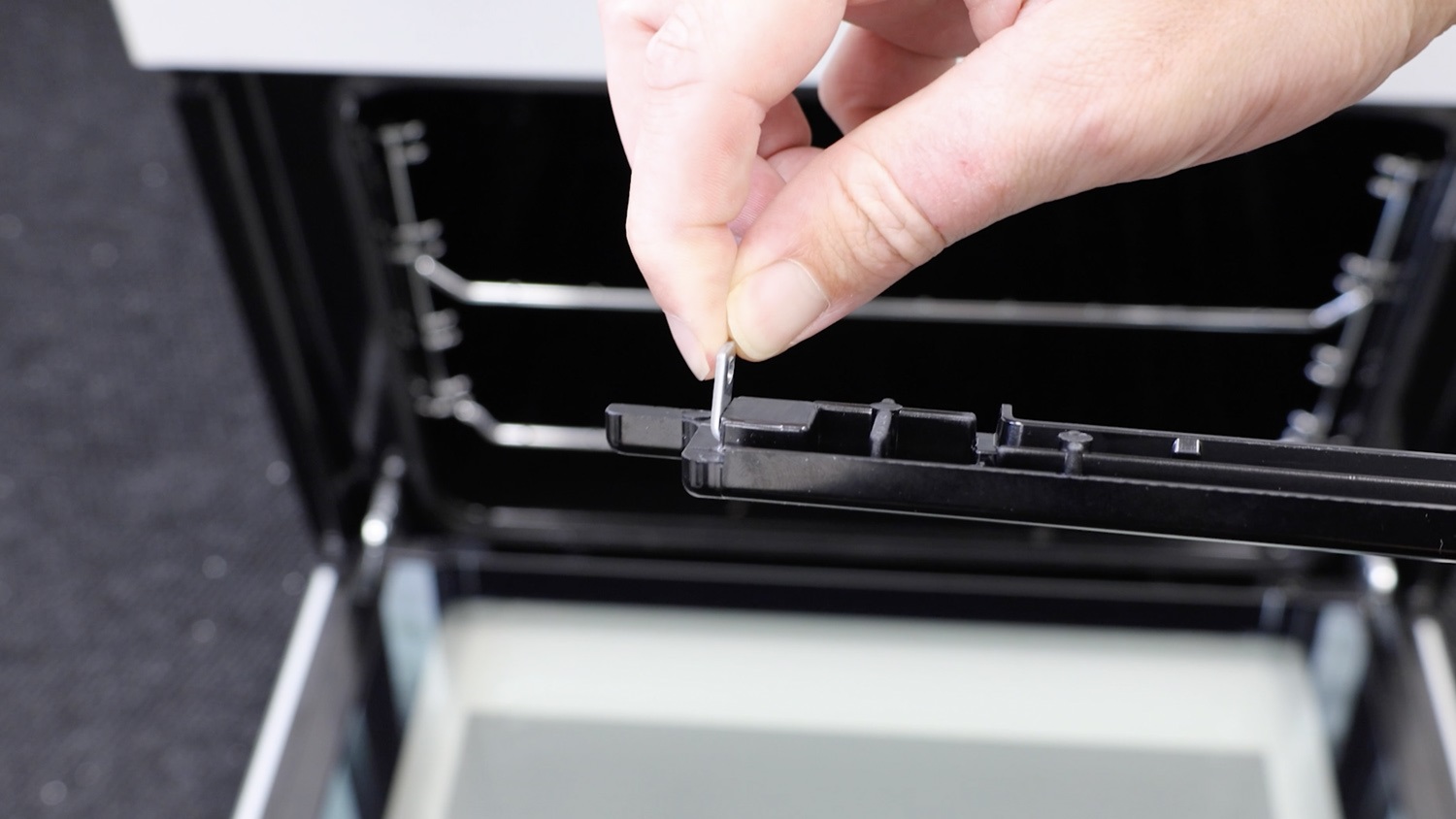 Attach bracket to trim