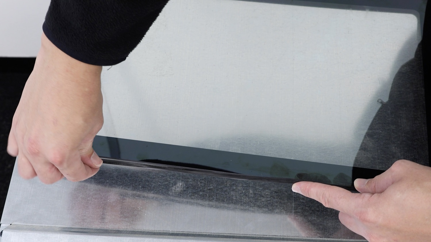 Attach seal to new inner door glass