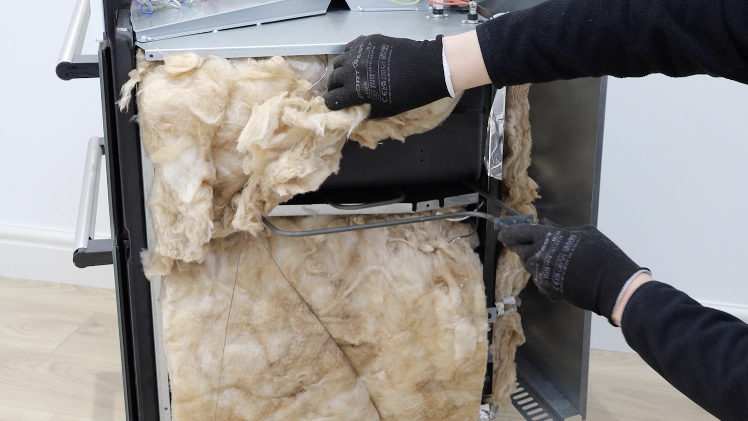Place new bottom element in oven