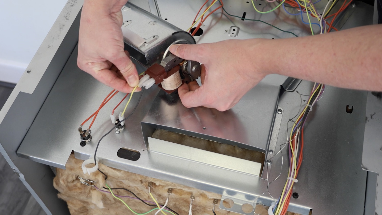 Connect the wiring to your new cooling fan motor