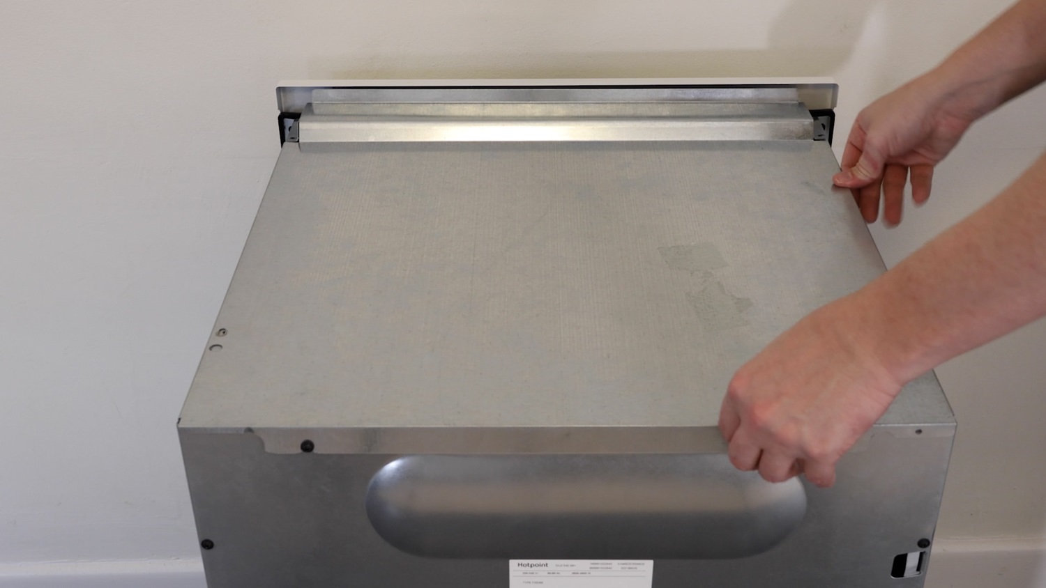 Re-attach top oven panel