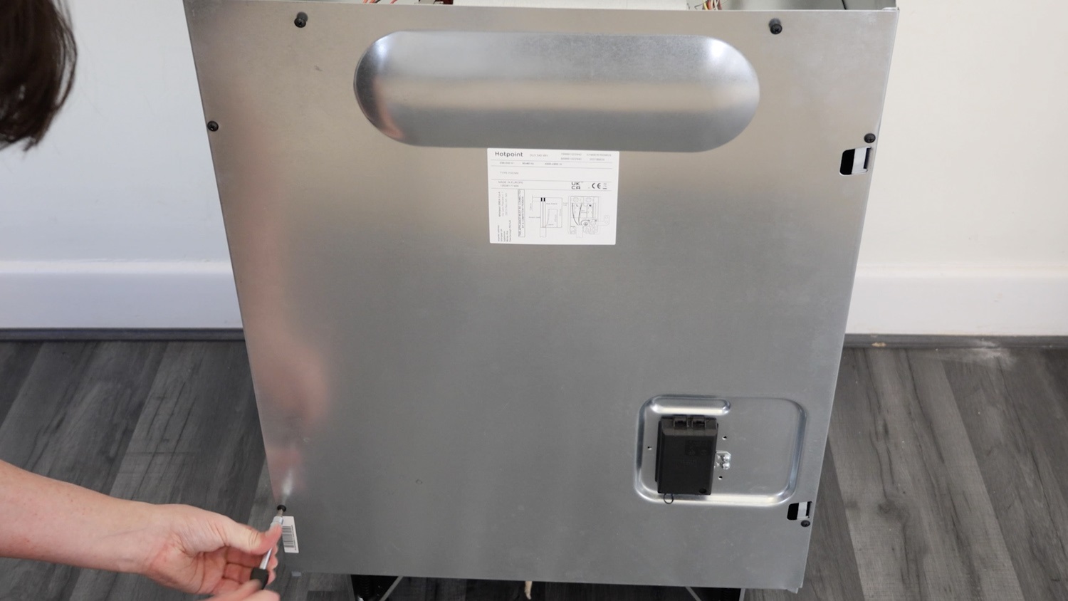 Re-screw screws on rear panel