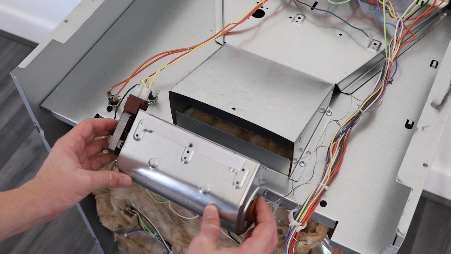 Slide old cooling motor out