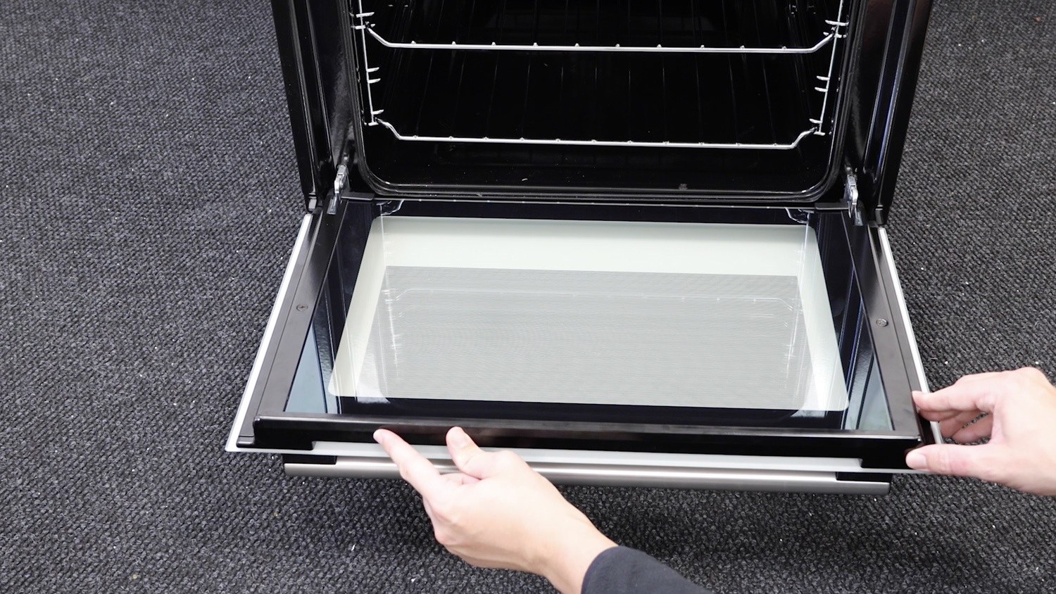 Re-attach plastic trim to oven door