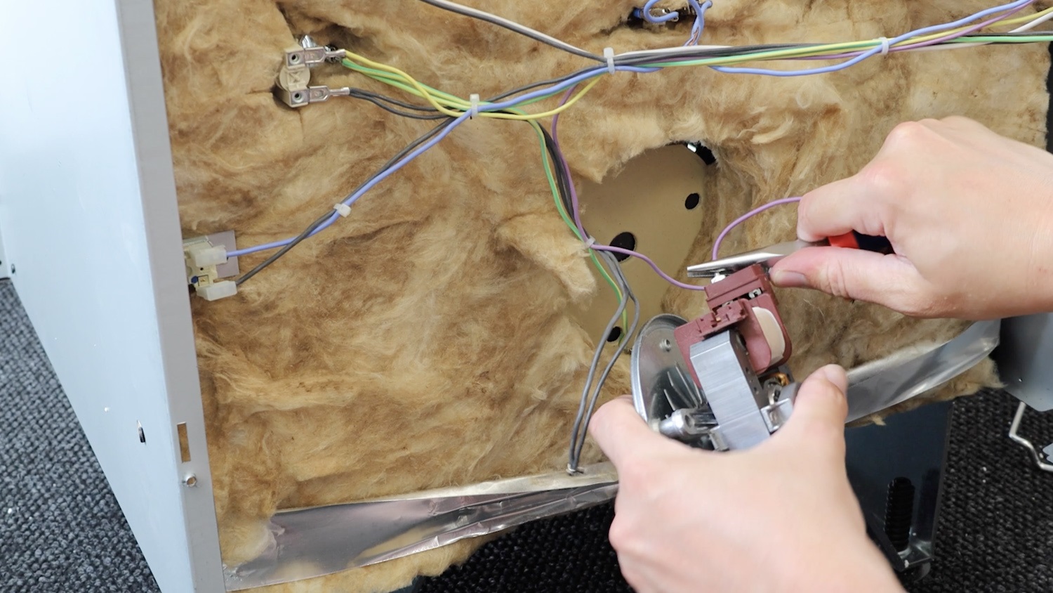 Remove old oven fan motor