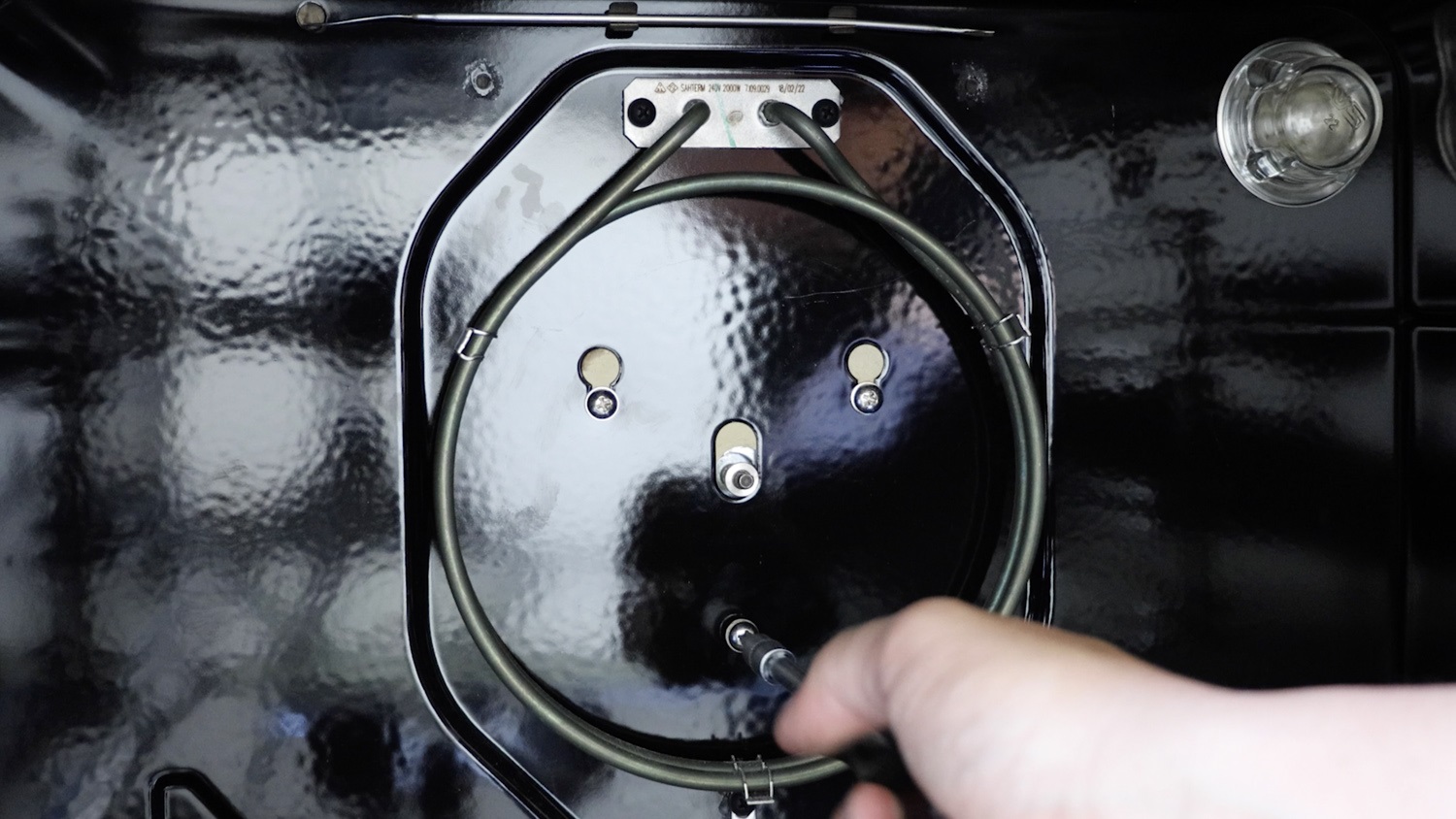 Fasten screws on front