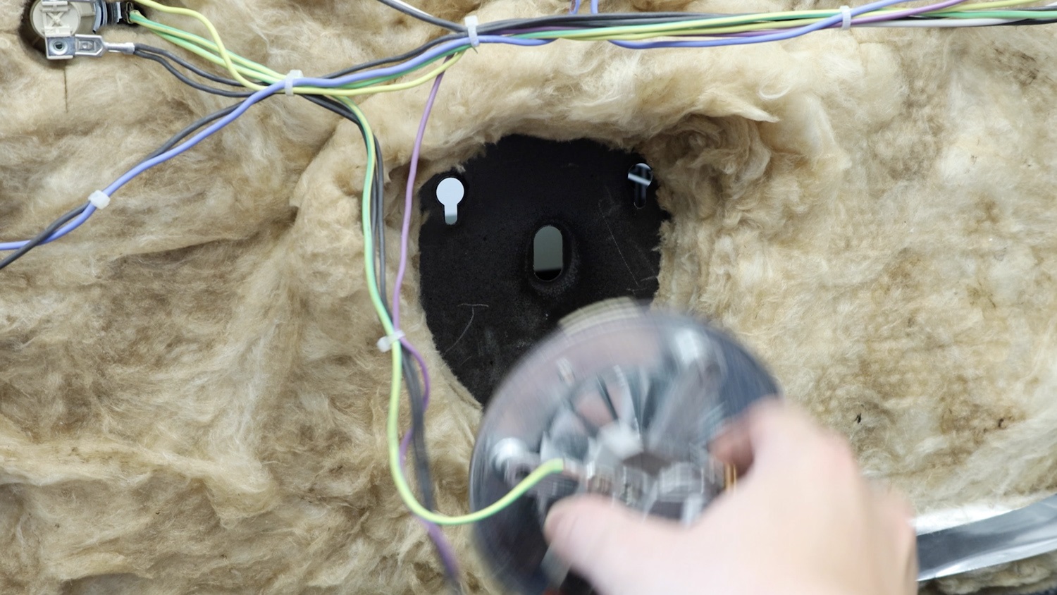 Insert the fan motor into the oven