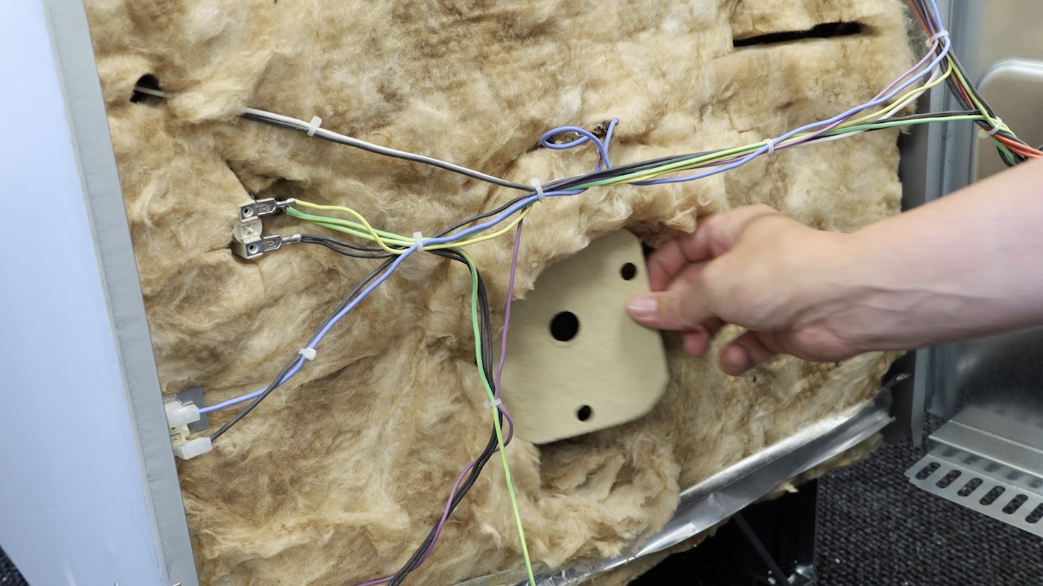 Remove old insulation plate.