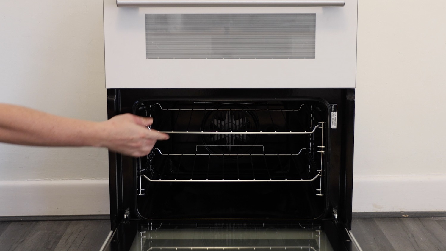 Re-insert any trays and racks