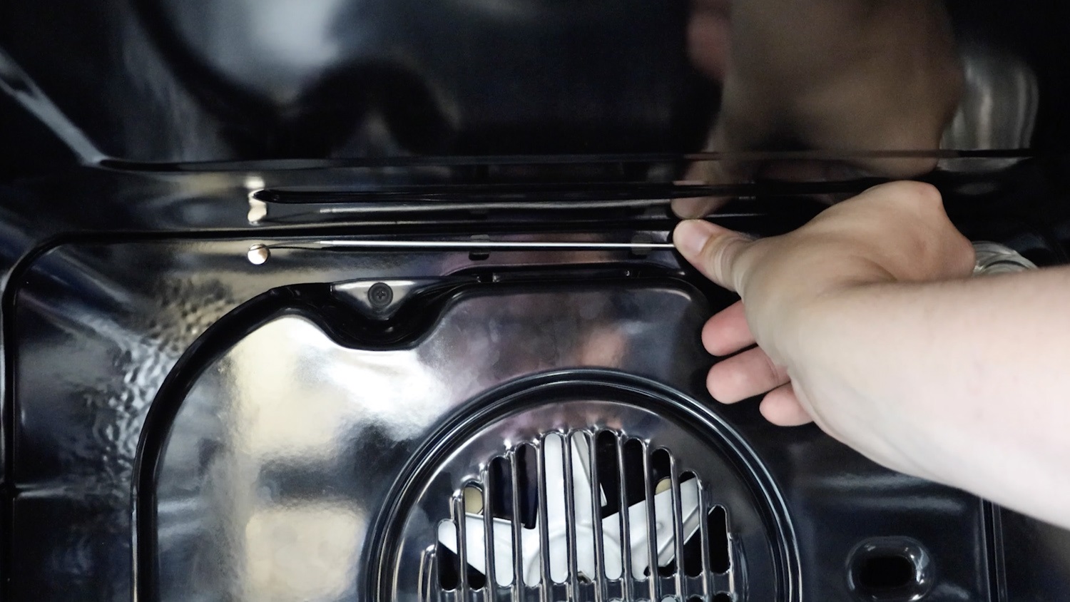 Clip capillary tube to back of oven