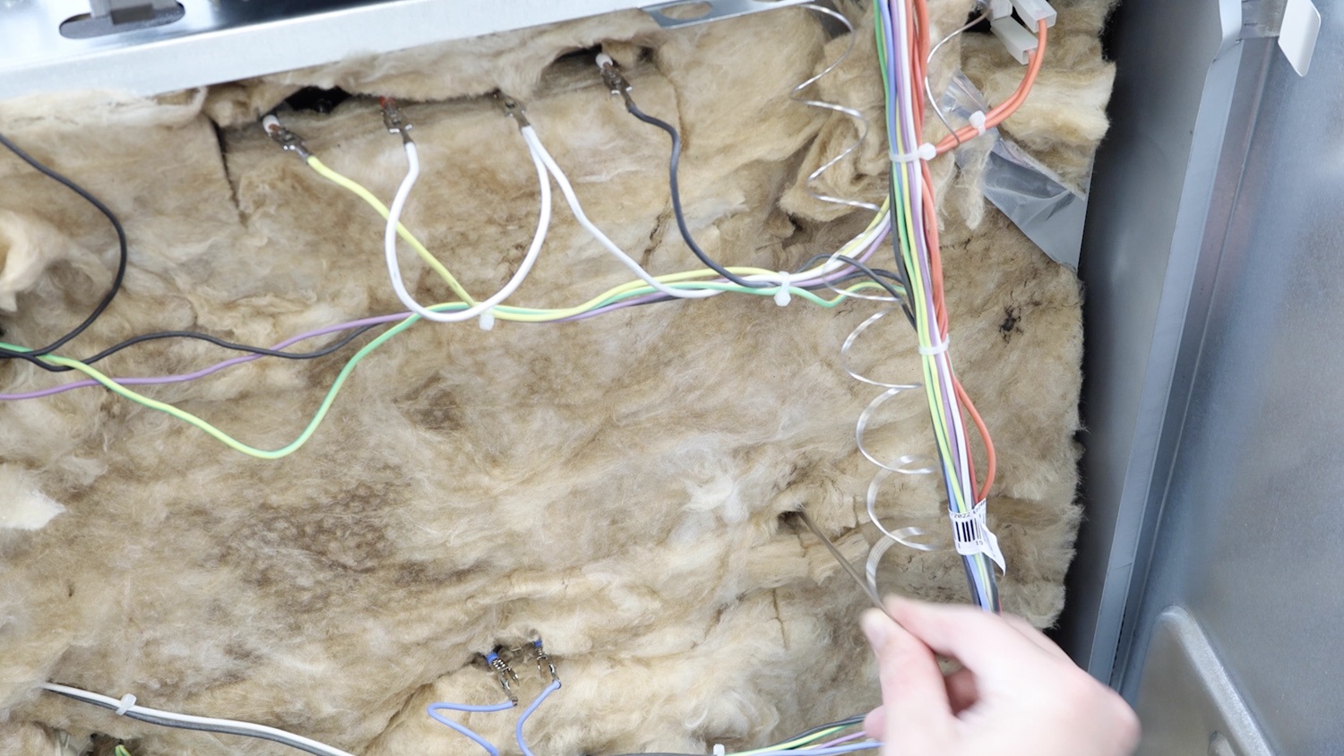 Slot new thermostat into the cavity