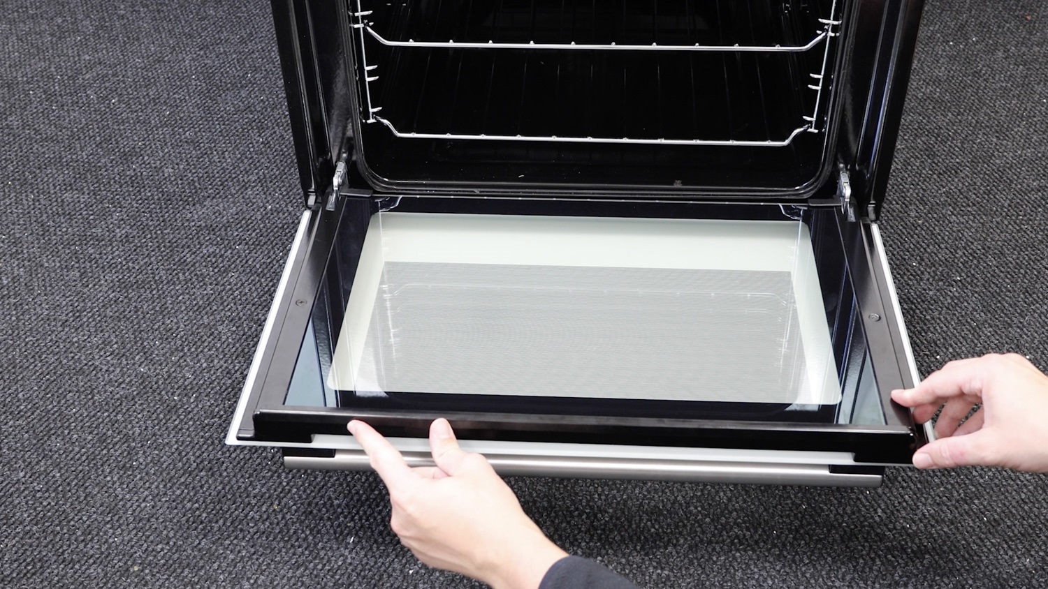 Place plastic trim on oven door